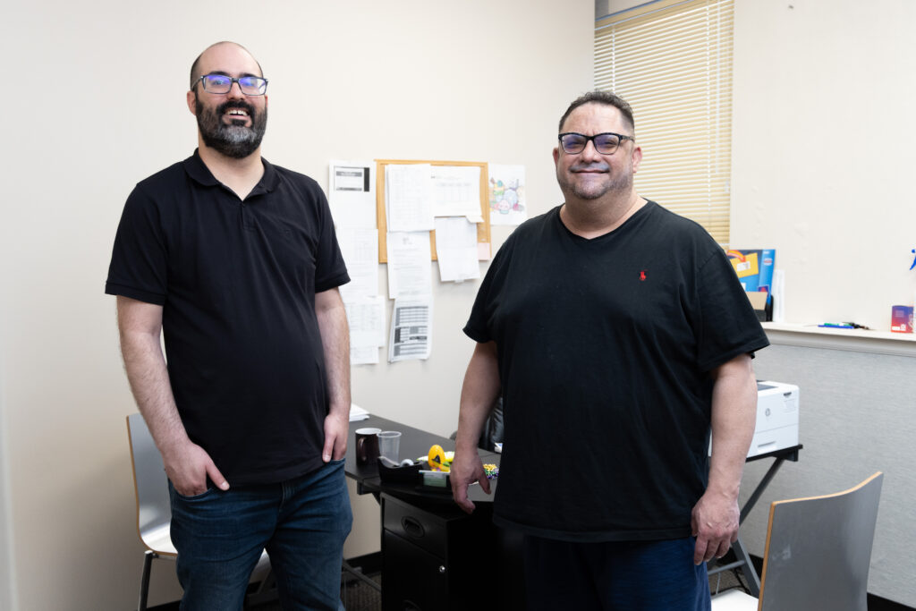 Benefits In Action benefit navigator and his client meet in the office