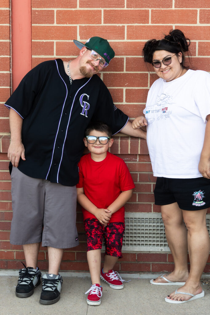 two parents and their young son